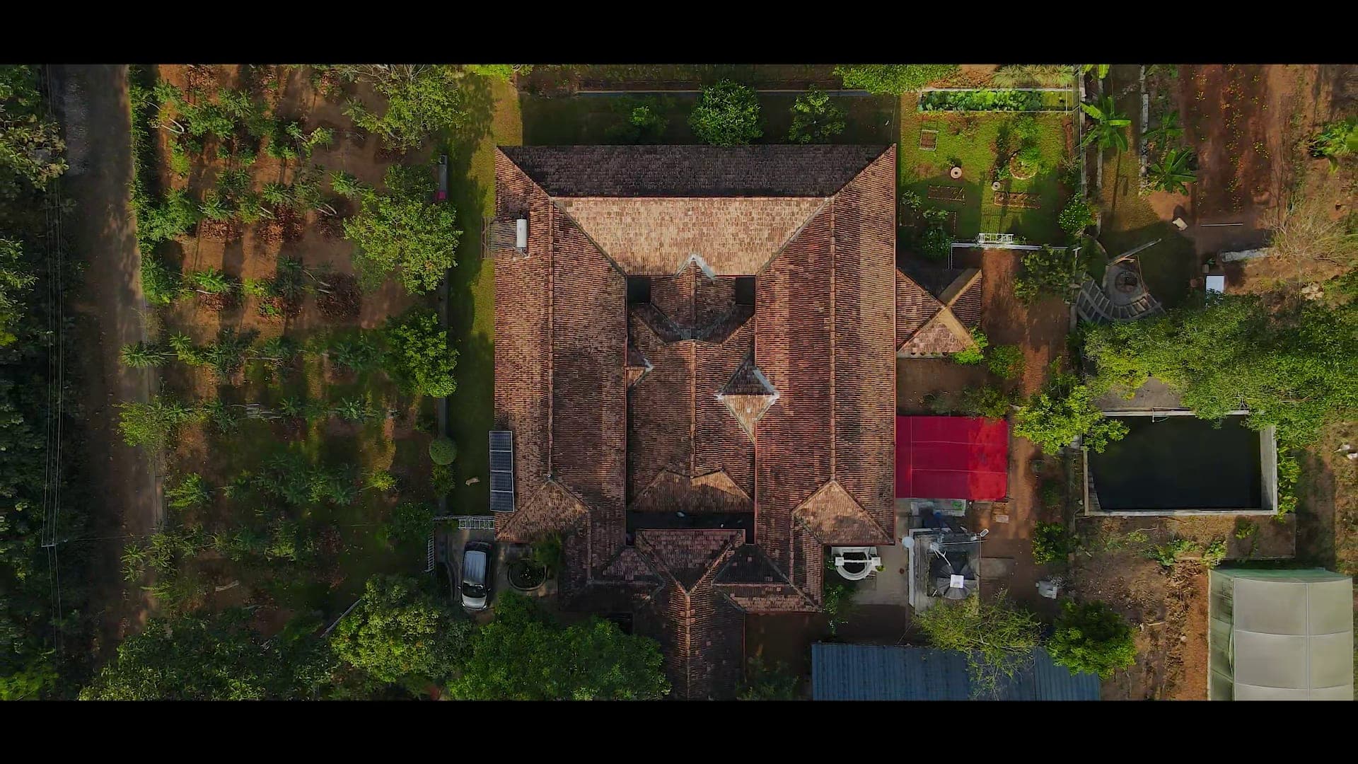 A bird's-eye view of the ancestral home and gardens at Nature's Gold Farms
